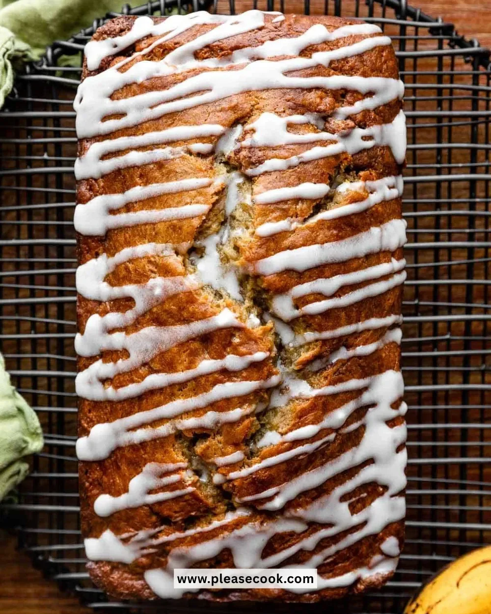 Delicious Cinnamon Swirl Banana Bread sliced on a wooden board