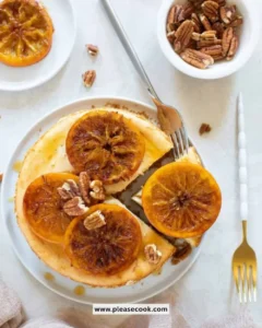 Creamy spiced orange cheesecake topped with citrus zest and spices