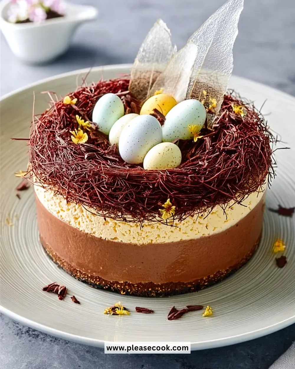 Easter Chocolate Mousse Cake with decorative chocolate shavings and berries