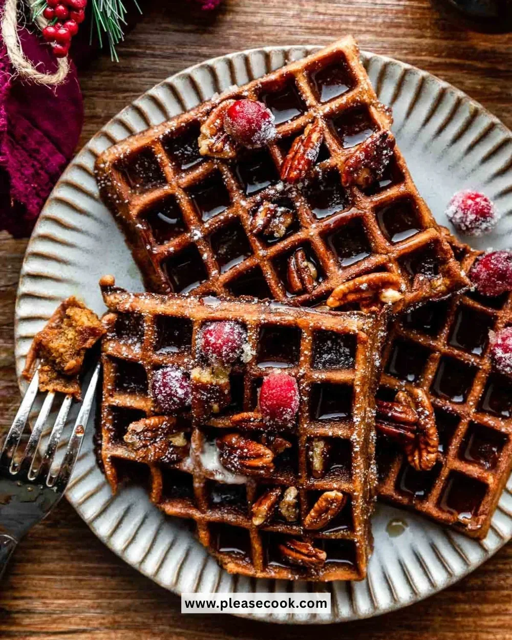 Delicious easy gingerbread waffles topped with syrup and cinnamon