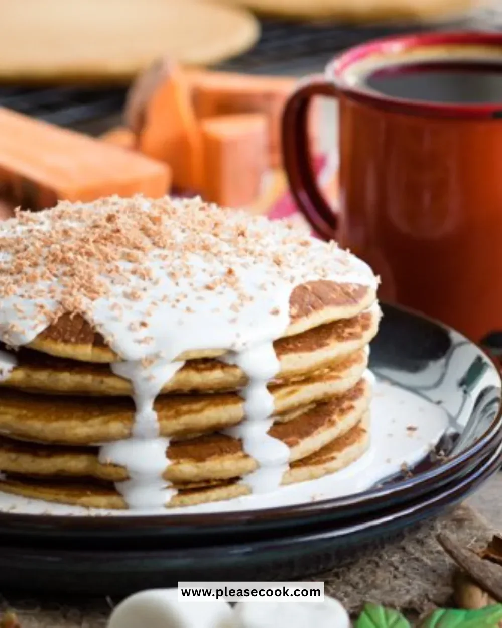 Fluffy and delicious homemade sweet potato pancakes topped with syrup and fruit.