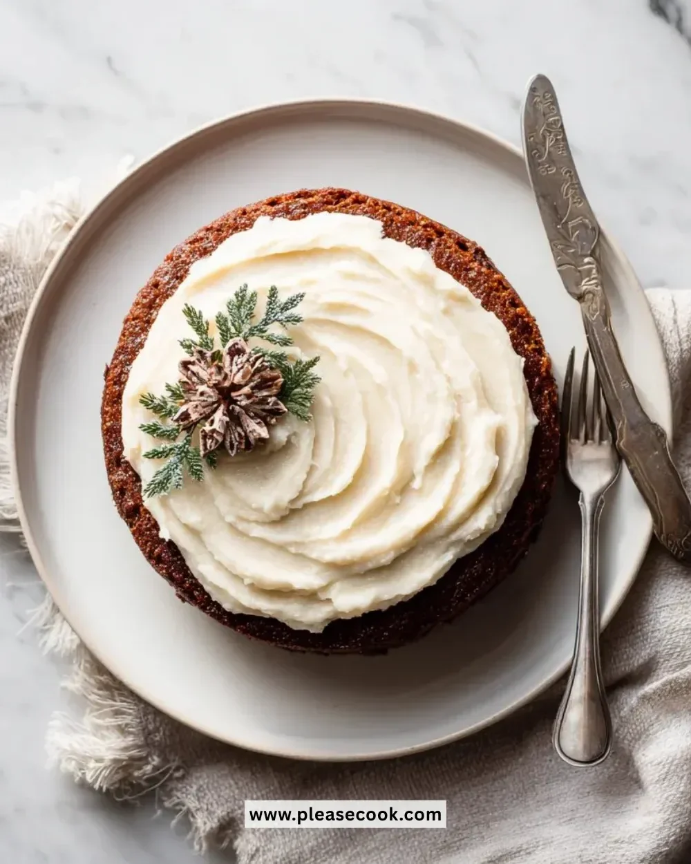 Slice of easy vegan gingerbread cake on a white plate with festive decorations