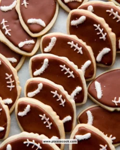 Delicious football-themed cookies decorated for game day.