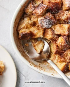 Delicious French Toast Casserole baked with cinnamon and topped with syrup