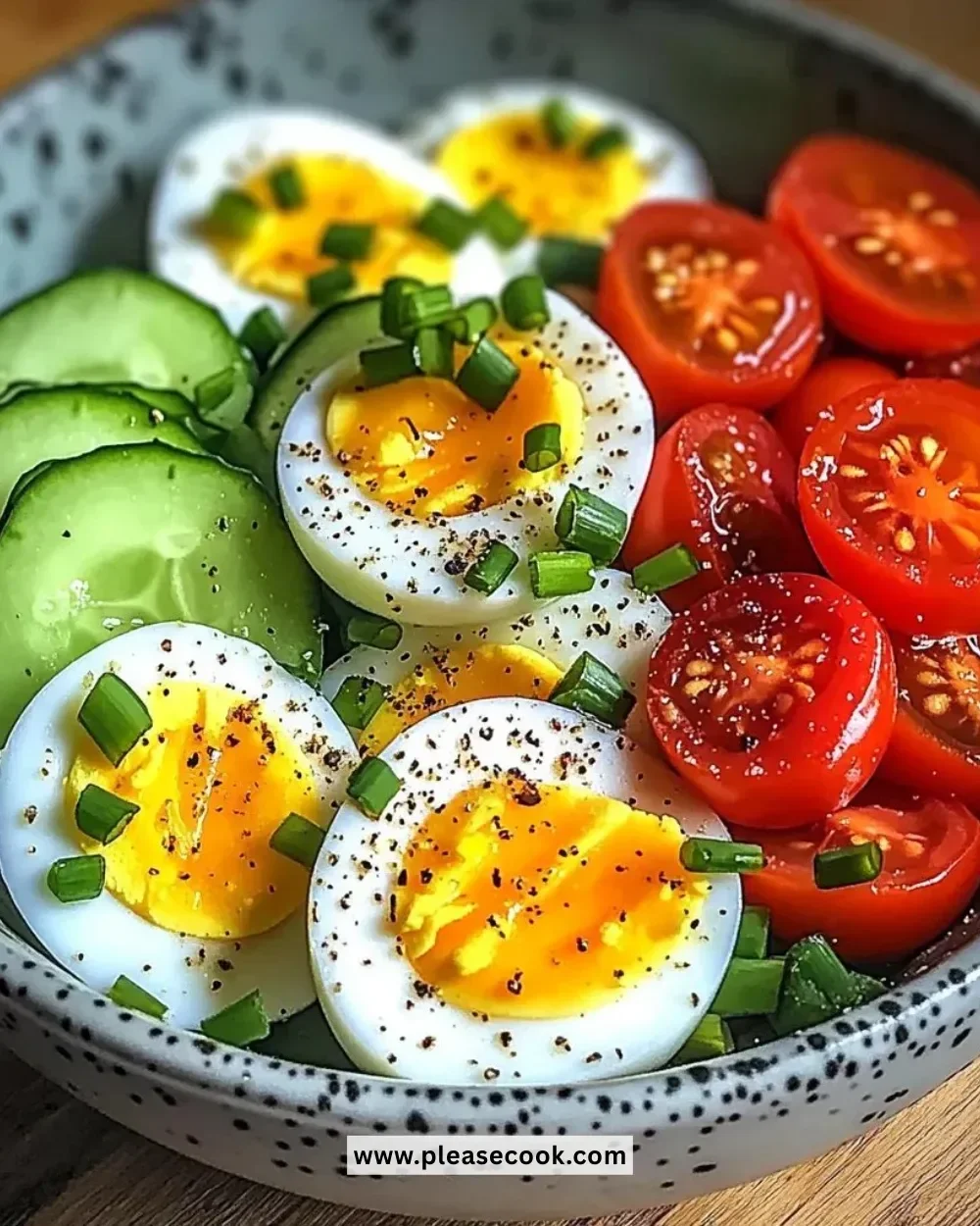 Fresh Garden Egg Bowl with cucumber and cherry tomatoes.
