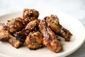 Delicious Honey Garlic Chicken Wings on a platter ready for serving