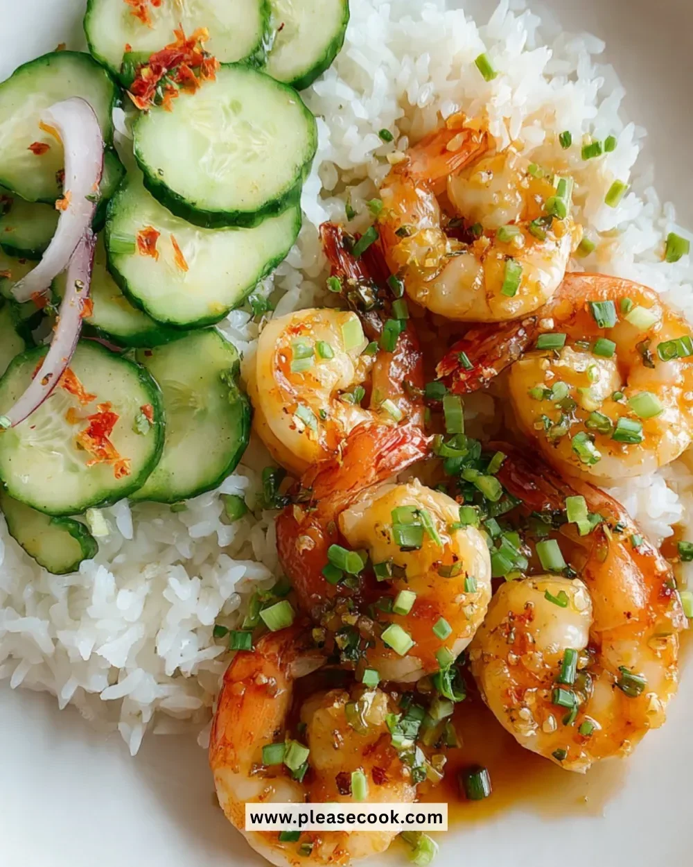 Plate of honey garlic shrimp garnished with green onions