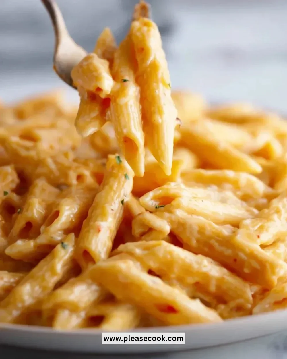 Creamy penne pasta cooked in an Instant Pot with fresh ingredients and rich sauce.