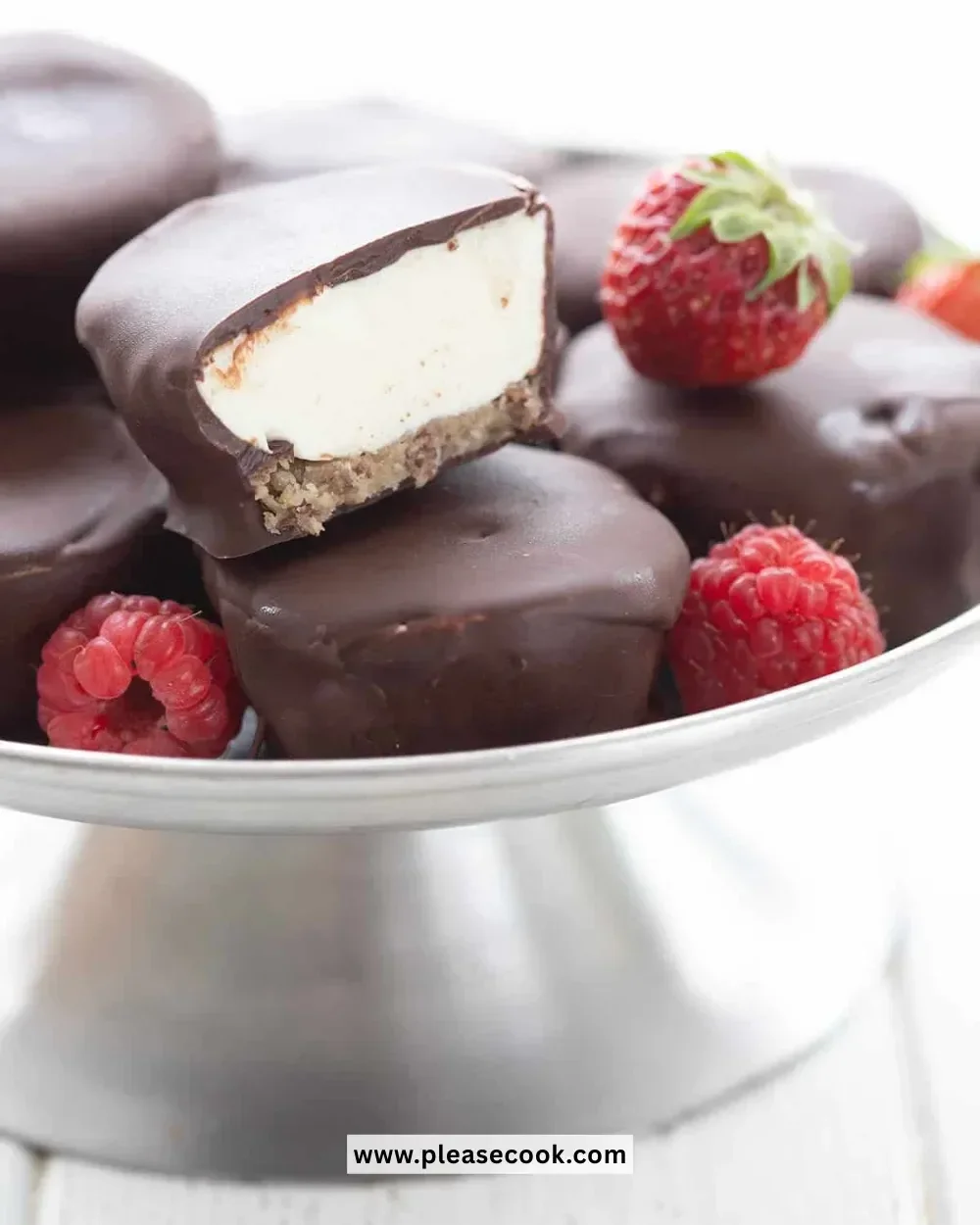 Delicious Keto Cheesecake Bites on a white plate, perfect for low-carb diets.