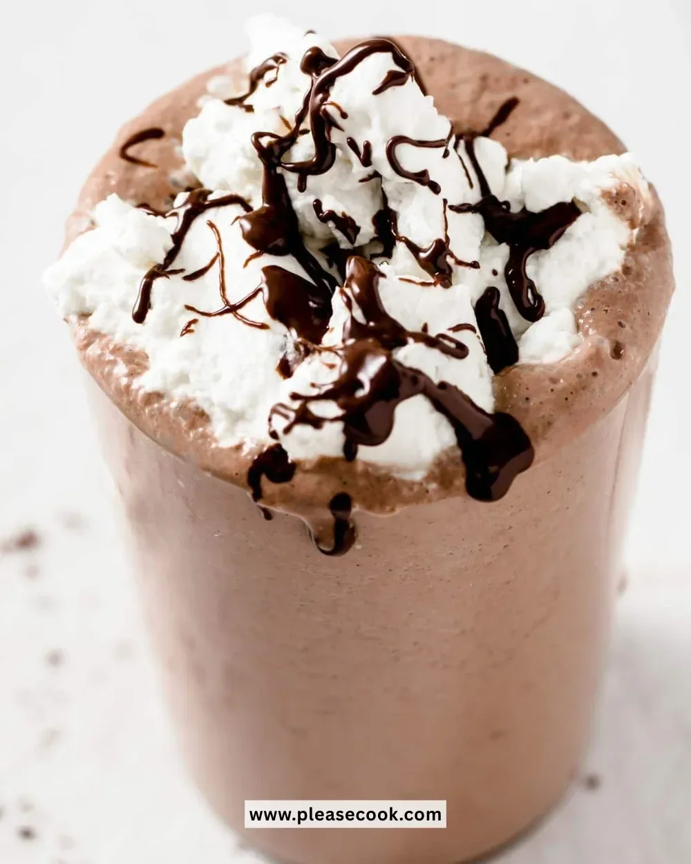 Delicious Keto Chocolate Milkshake topped with whipped cream in a glass
