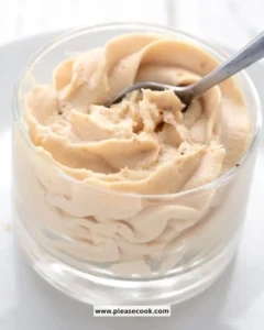 Delicious Keto Peanut Butter Mousse in a dessert bowl topped with peanuts