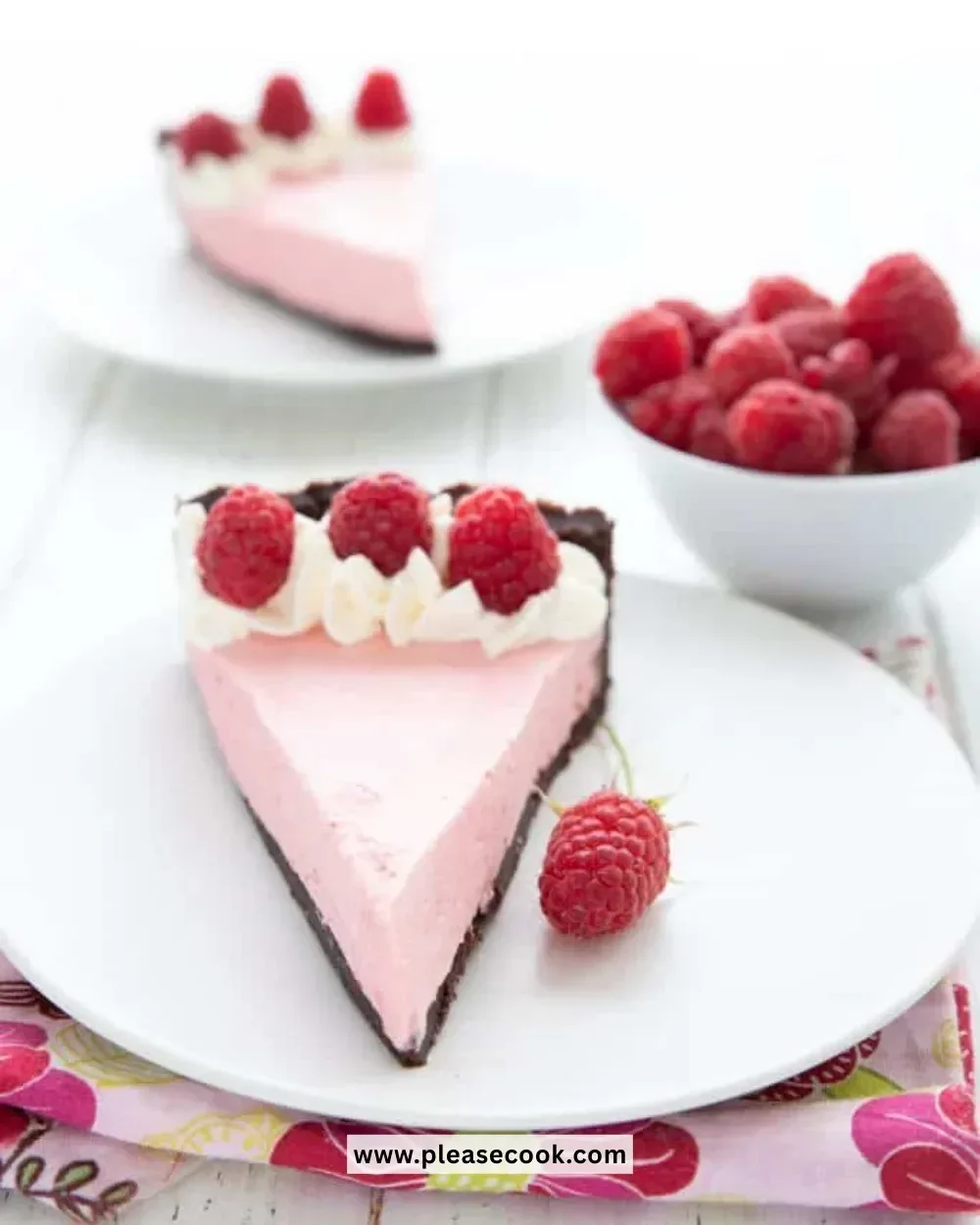 Keto Raspberry Mousse Tart with fresh raspberries and a creamy filling