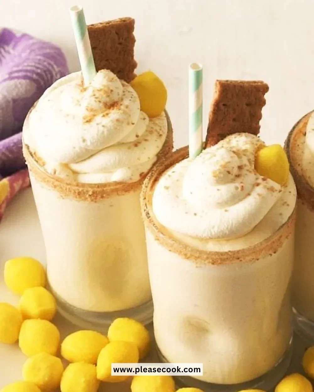 Creamy lemon pie milkshake topped with whipped cream and lemon zest
