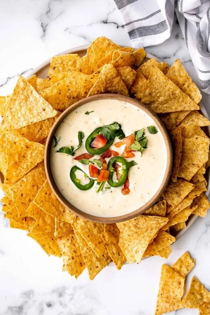 Delicious Mexican cheese dip served with tortilla chips