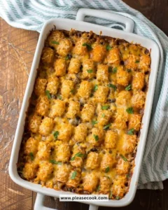 Delicious Mexican Tater Tot Casserole topped with melted cheese and fresh toppings