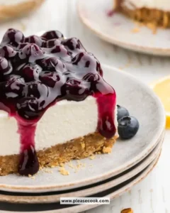 Delicious no-bake blueberry cheesecake with fresh blueberries and cream cheese topping