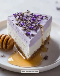 No Bake Honey Lavender Cheesecake topped with lavender sprigs and honey drizzle.