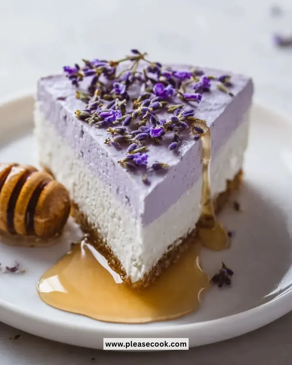 No Bake Honey Lavender Cheesecake topped with lavender sprigs and honey drizzle.