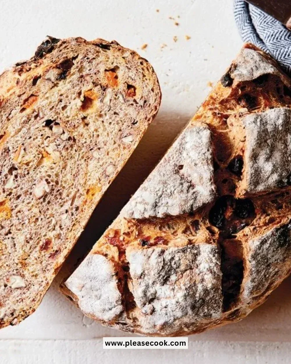 No-Knead Harvest Fruit Bread with dried fruits and nuts on a wooden table