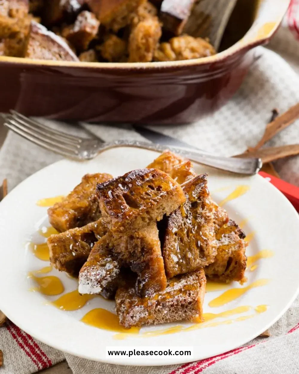 Slice of baked gingerbread French toast topped with syrup and spices