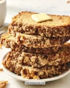 Fluffy pancake bread sliced on a wooden board, perfect for breakfast.