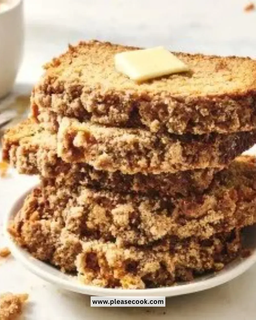 Fluffy pancake bread sliced on a wooden board, perfect for breakfast.