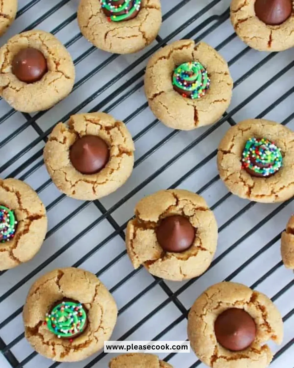 Delicious Peanut Butter Blossoms cookies topped with chocolate kisses.
