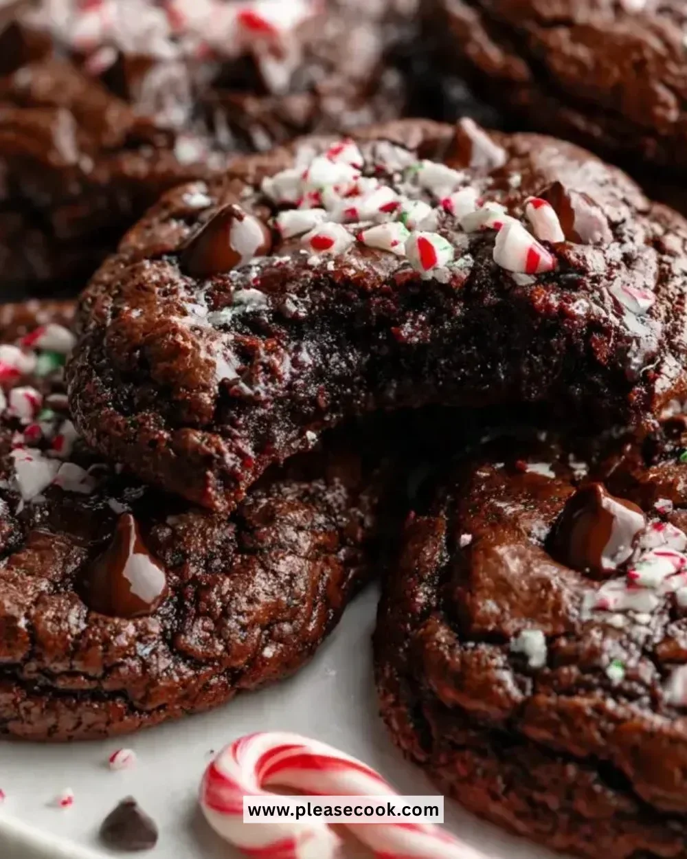 Delicious peppermint brownie cookies with festive toppings on a plate.