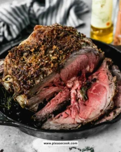 Juicy prime rib roast cooked to perfection, served with sides.