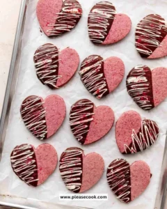 Freshly baked raspberry sugar cookies on a cooling rack