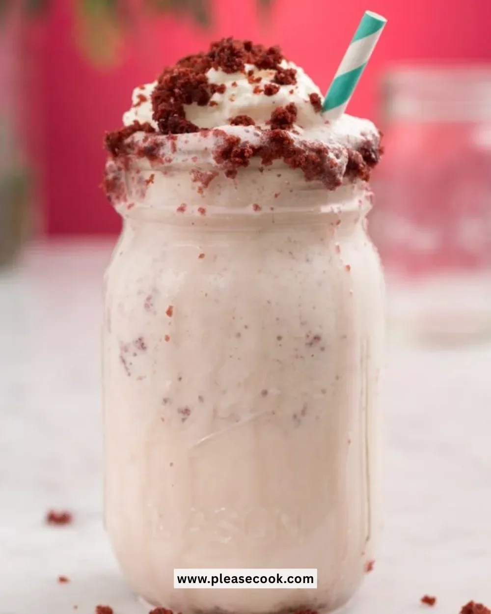 Red Velvet Cheesecake Milkshake with whipped cream and cherry on top