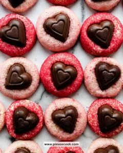 Sparkle Sweetheart Cookies decorated with colorful sprinkles