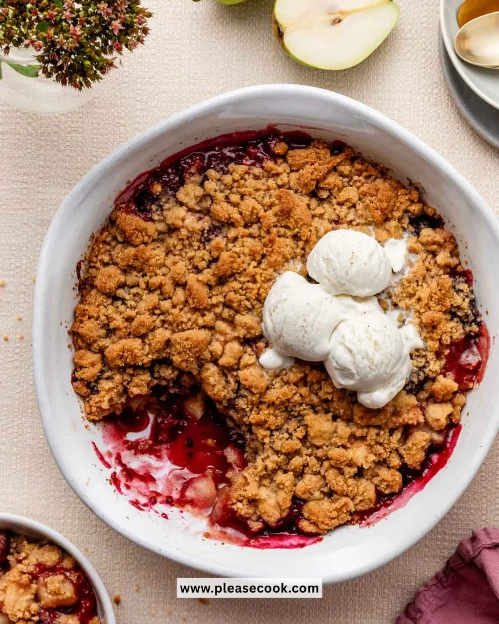 Spiced pear berry crumble dessert with fresh fruit and crispy topping