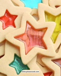 Colorful stained glass cookies arranged beautifully on a plate