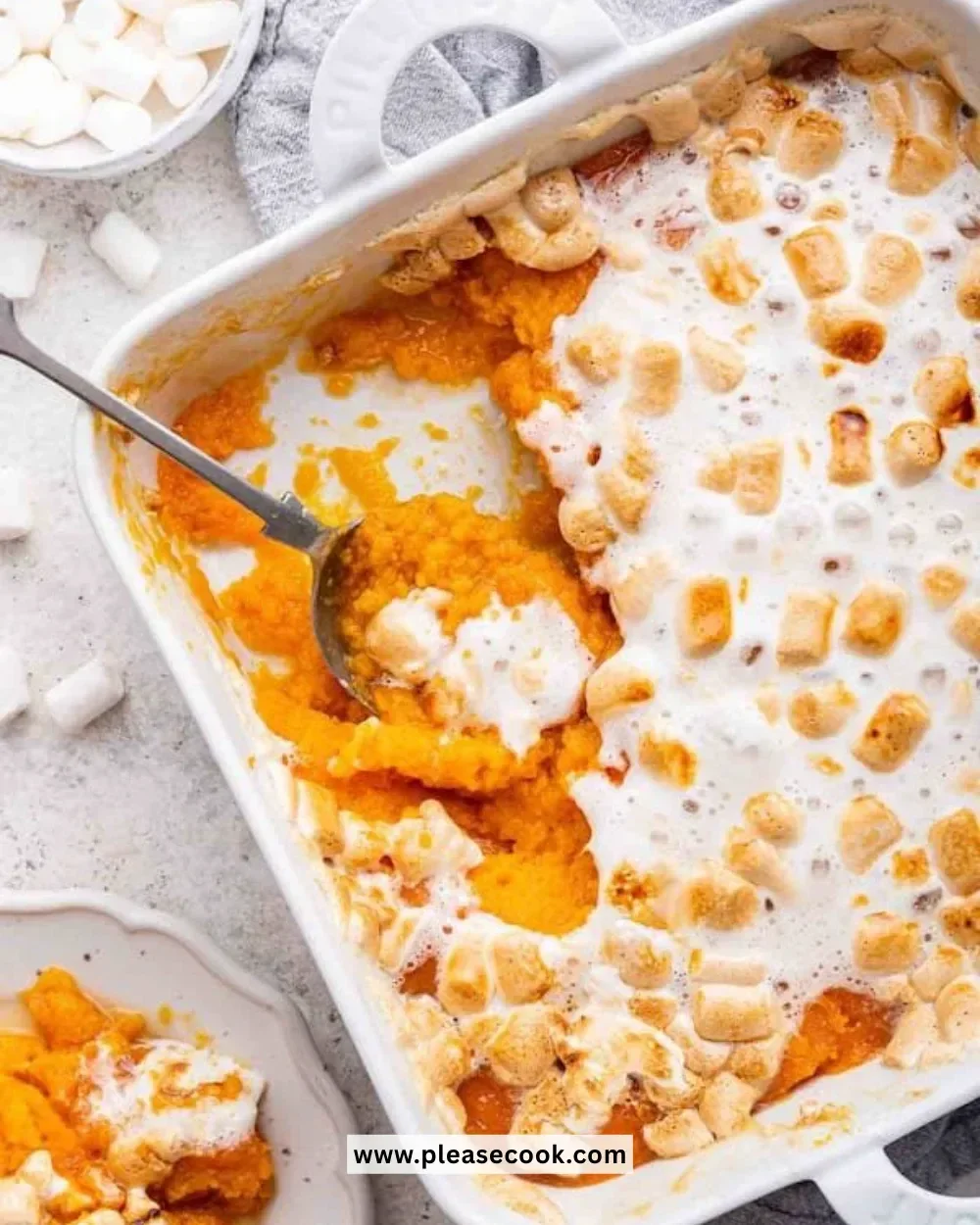 Delicious sweet potato casserole topped with marshmallows for a festive dish