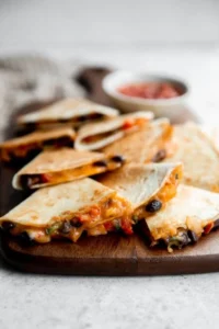 Delicious vegetarian quesadillas filled with vegetables and cheese.