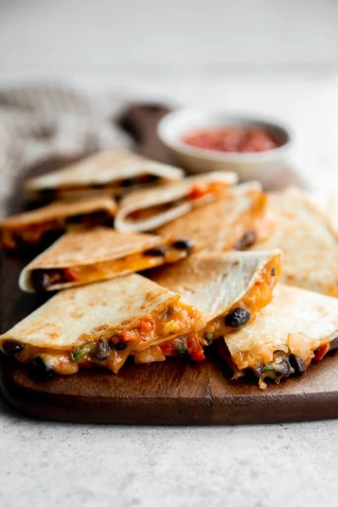 Delicious vegetarian quesadillas filled with vegetables and cheese.