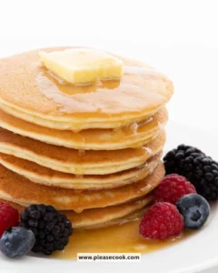 Delicious Almond Flour Keto Pancakes stacked with syrup