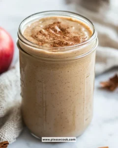 Refreshing Apple Cinnamon Smoothie in a glass with cinnamon sprinkled on top