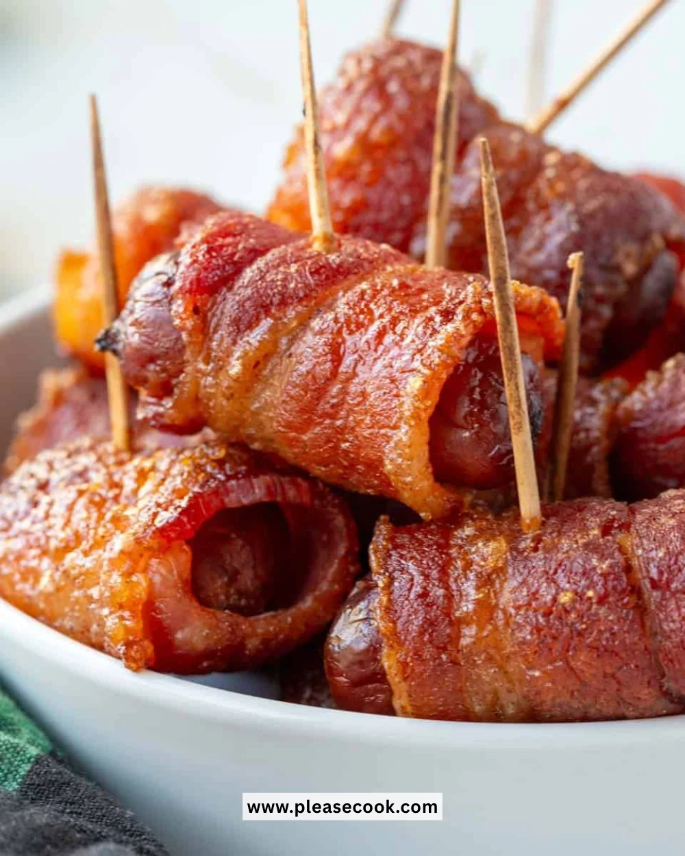 Delicious Bacon Wrapped Smokies appetizer served on a platter.