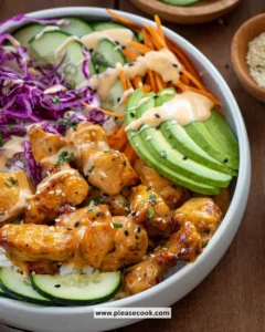 Delicious Bang Bang Chicken Bowl with crispy chicken, vegetables, and sauce