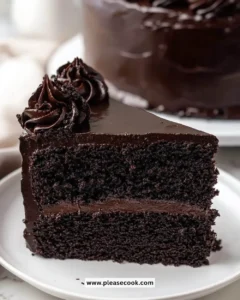 Deliciously moist Black Velvet Cake beautifully decorated and ready to serve.