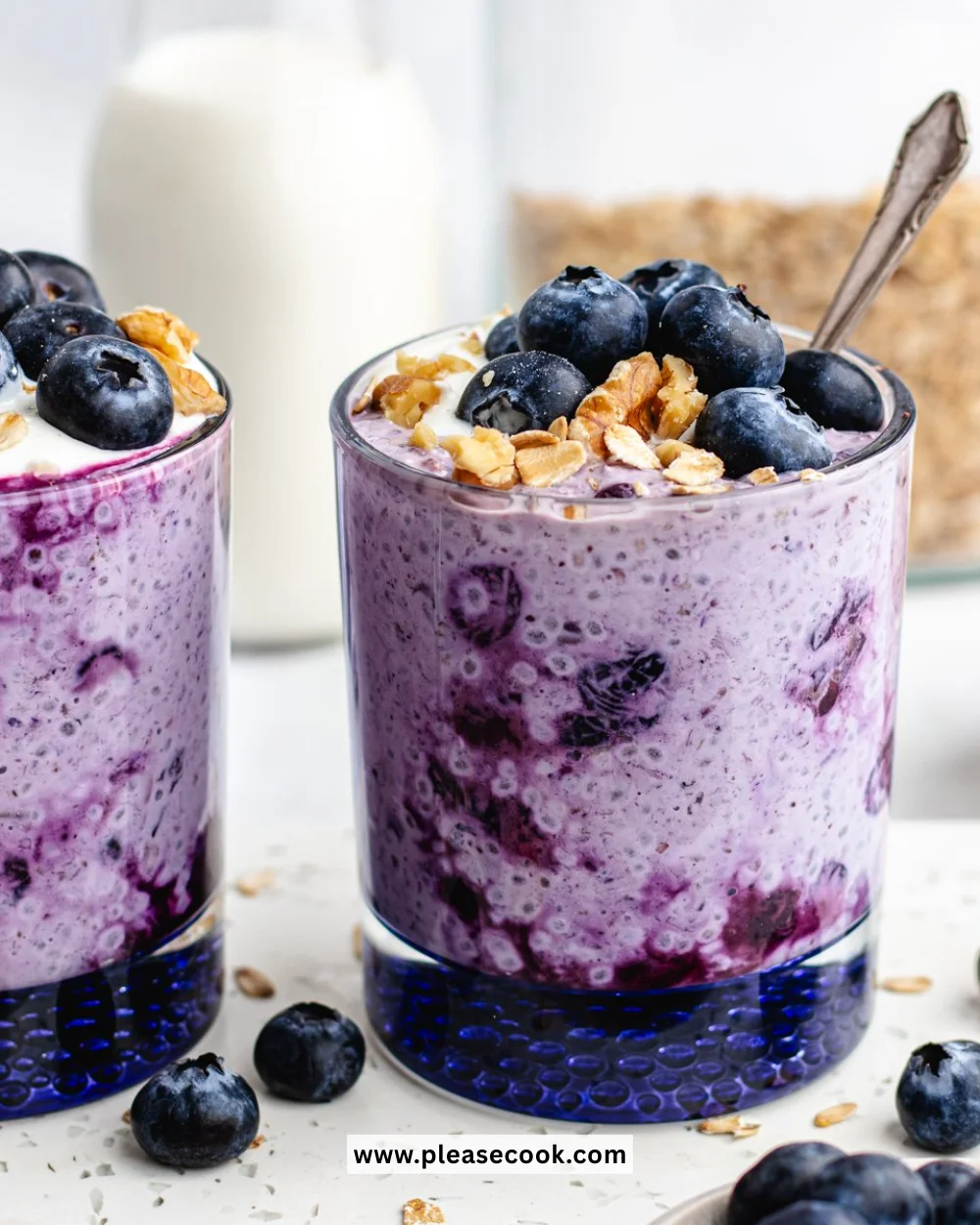 Delicious bowl of blueberry overnight oats topped with fresh blueberries and almonds
