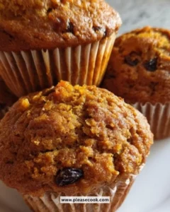 Homemade bran muffins displayed on a wooden table, healthy snacks