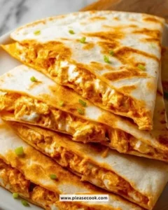 Buffalo Chicken Quesadillas with spicy chicken and cheese on a plate