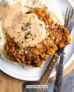 Delicious Chicken Fried Steak served with creamy gravy and sides