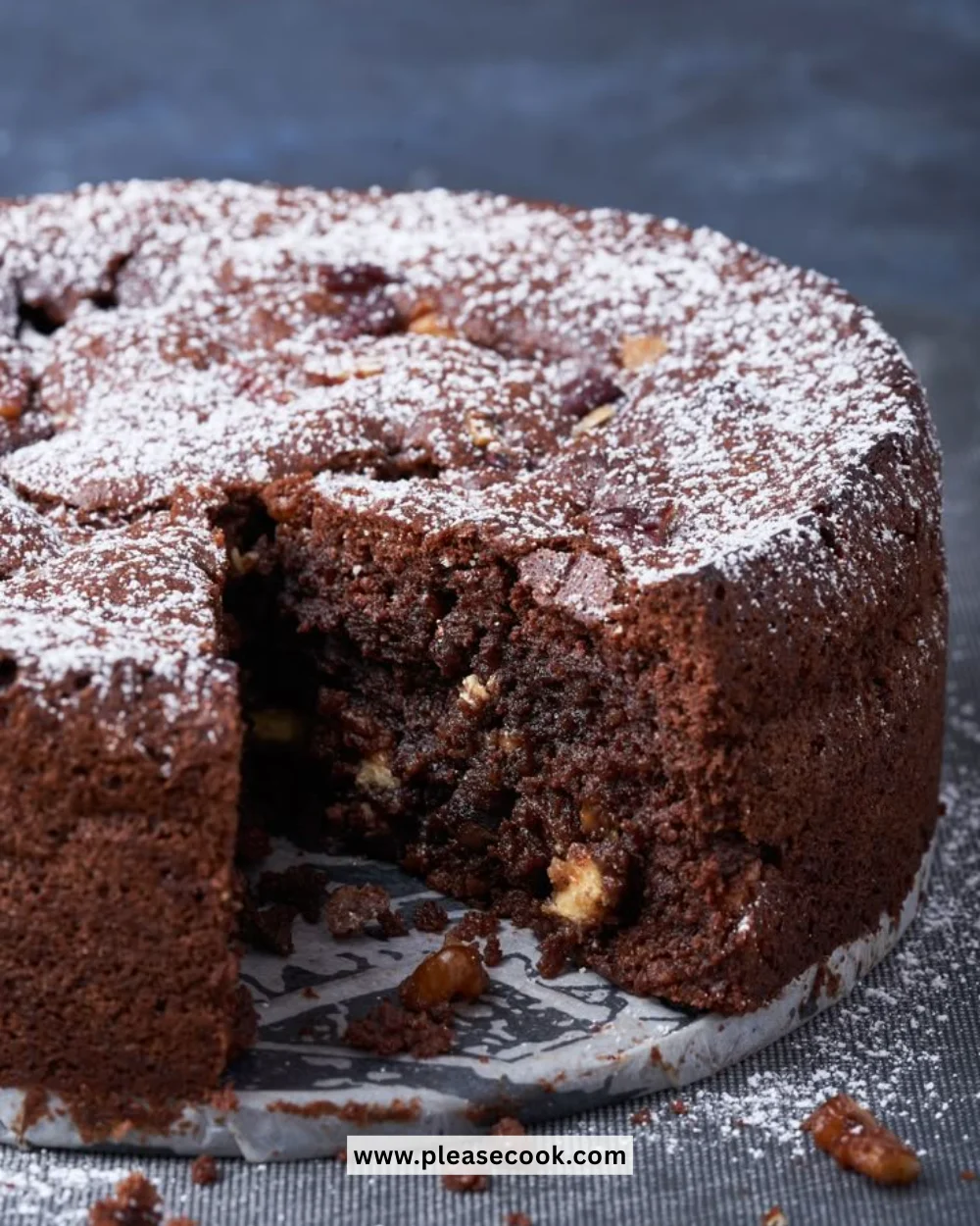Deliciously rich chocolate brownie cake with a glossy chocolate ganache