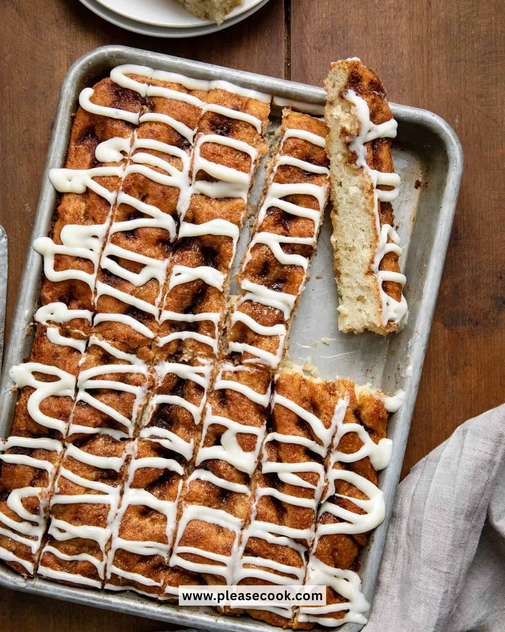 Delicious cinnamon roll focaccia bread topped with icing and cinnamon