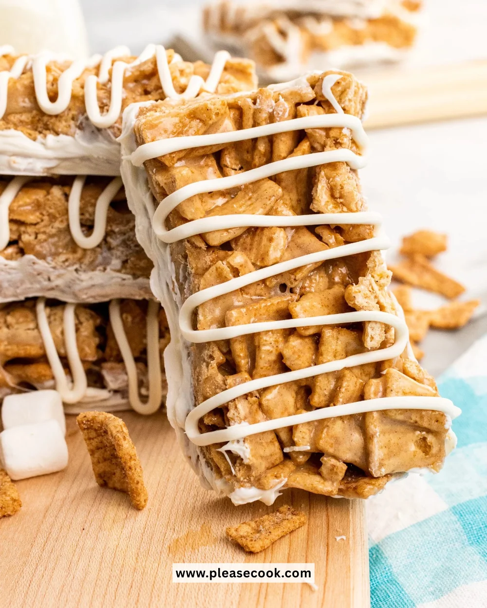 Plate of homemade Cinnamon Toast Crunch Treats with marshmallows and chocolate