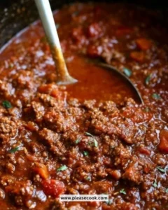 Delicious Crockpot Bolognese Sauce simmering in a slow cooker